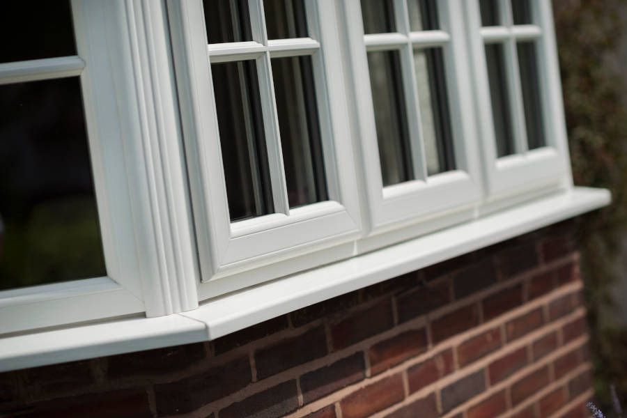 astragal white casement windows bay